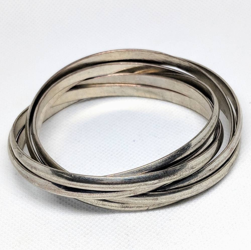 Six Interlocking Silver Tone Bangle Bracelets - image 1